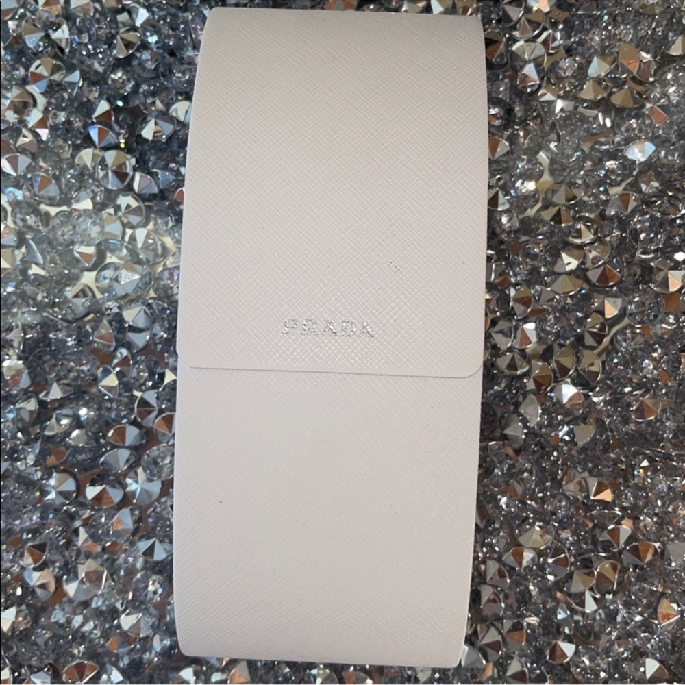 White Leather Sunglasses Case W/ New In Plastic Wipey + Card
Prada
$85 - Picture 2 of 6